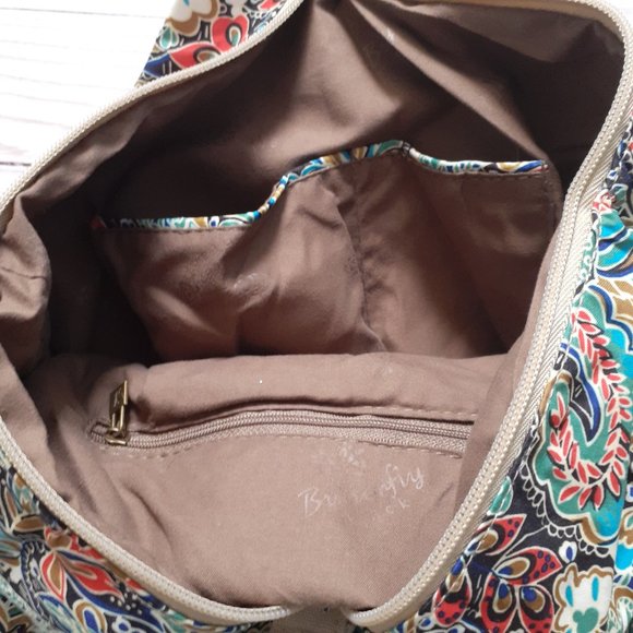 Black Butterfly Canvas Backpack in a Blue Floral Print - Picture 10 of 12